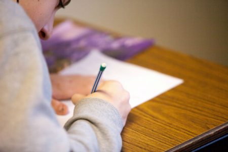 student with pencil