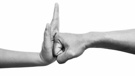 Hand stopping a punch